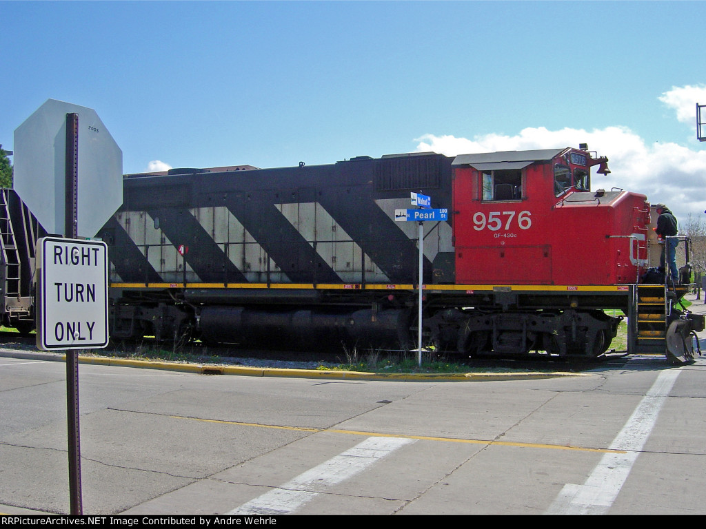 Riding the porch of CN 9576